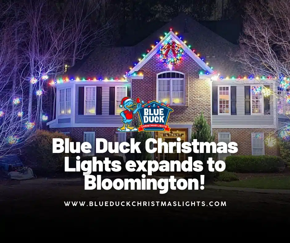 Christmas light installation service from Blue Duck is now available in Bloomington, transforming this home with exterior lighting, tree & shrub lighting, and Christmas wreaths.