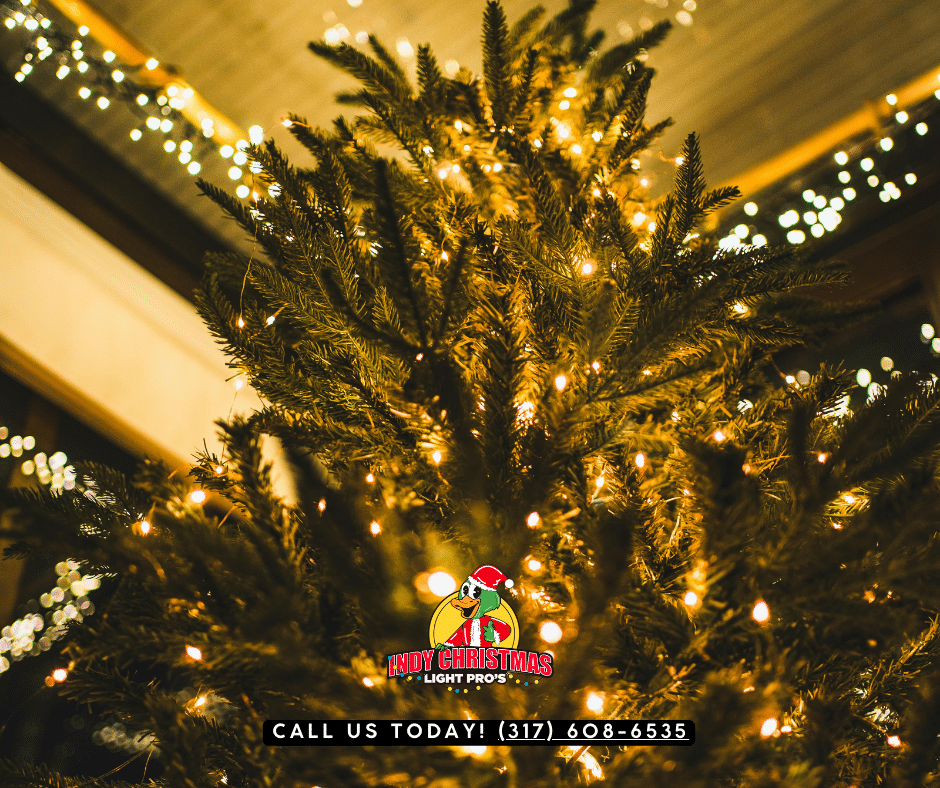 Professional indoor lighting installation service decorating Christmas tree in Indiana home by Indy Christmas Light Pros.