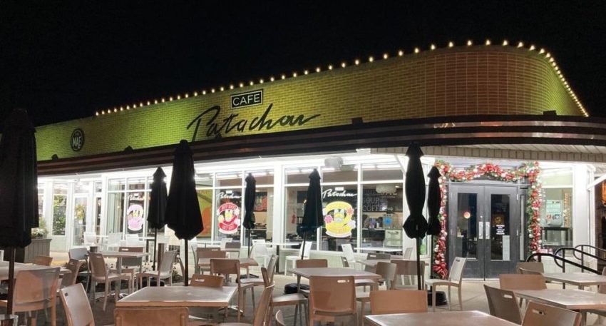 Cafe in Indiana featuring professional exterior commercial Christmas lighting installed by Indy Christmas Pros.